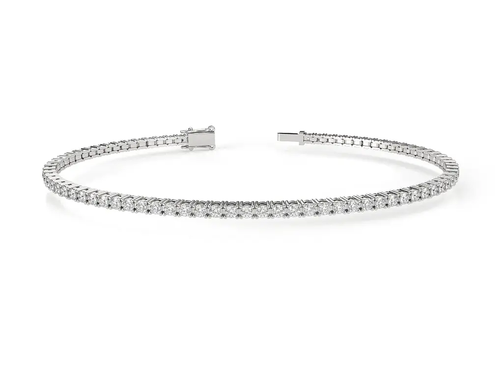 ELYSIA - A classic four-prong round brilliant-cut diamond tennis bracelet set in a sleek two-rail design