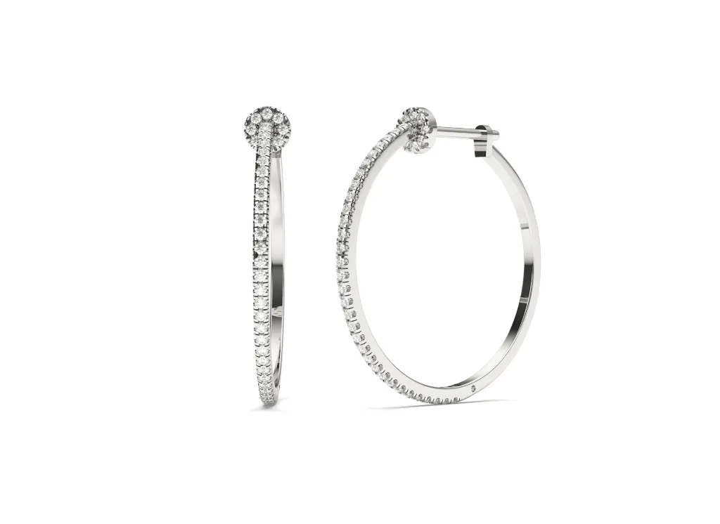 SERENIQUE-A pair of platinum hoop earrings adorned with evenly spaced round-cut diamonds along the outer edge - VER29906